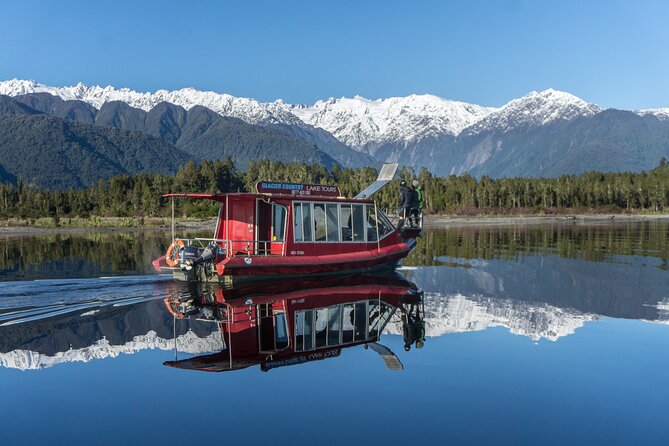 2-Hour Scenic Cruise in Lake Mapourika - A rainforest shoreline with birds and kiwi conservation