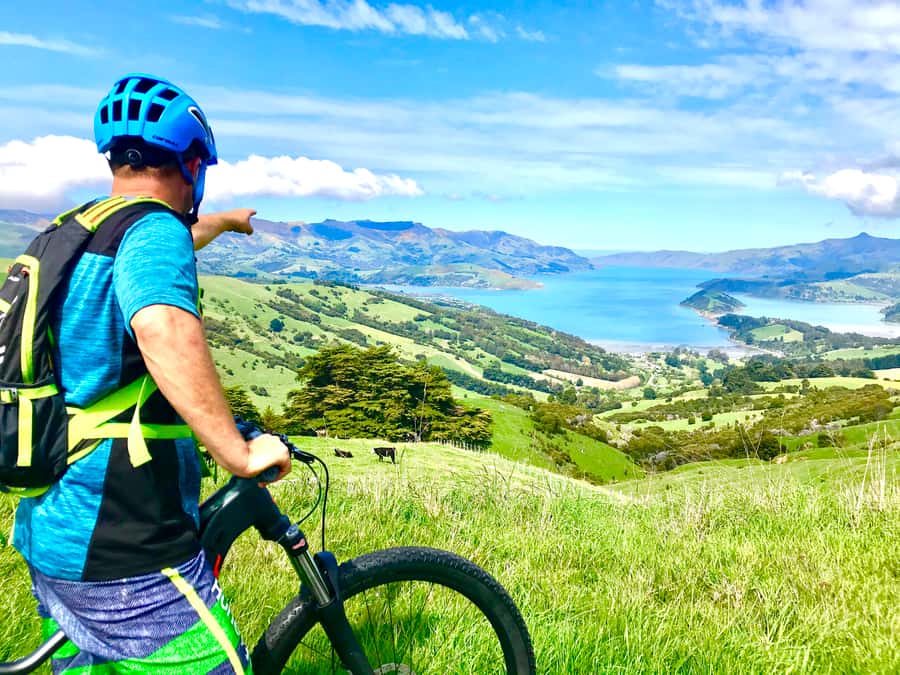 Akaroa Explorer: Guided Electric Mountain Bike Tour - Akaroa village by electric bike
