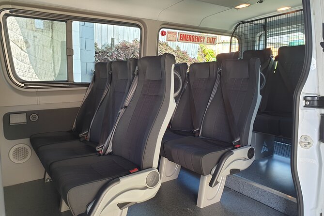 Auckland Airport Private Transfers in a Luxury Minibus - Meeting your driver inside Auckland Airport