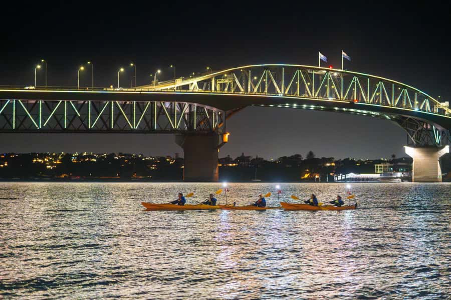 Auckland: City Lights Night Kayak Tour - Paddling beside the Auckland Harbour Bridge