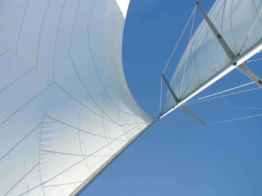 Bay of Islands: Awesome Day Sailing Tour with Island Stop - The Bay of Islands by sail, caves, and lava rock