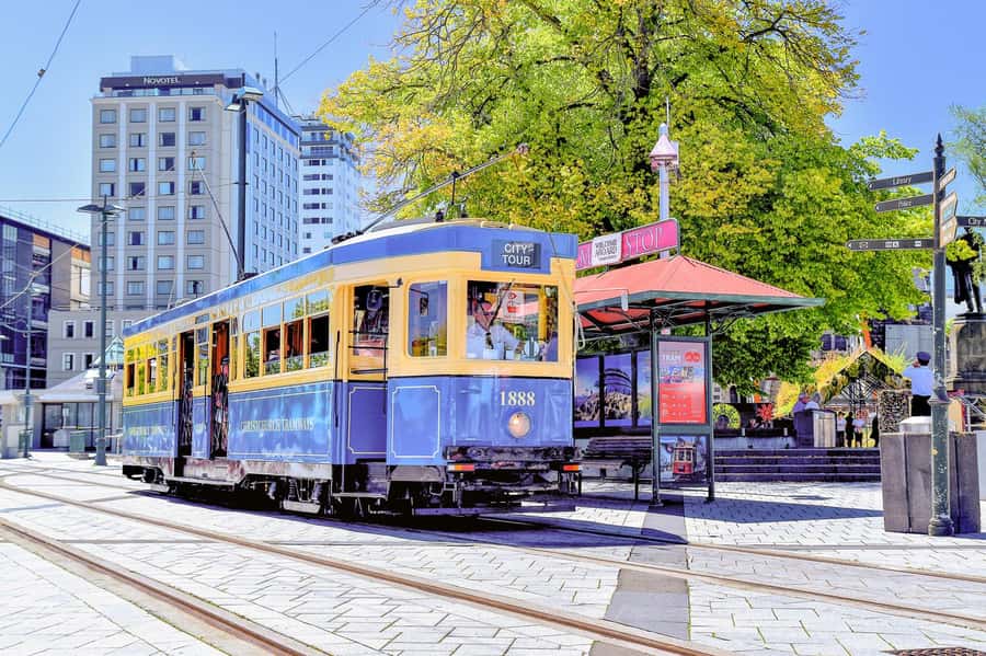 Christchurch Tram City Tour & Punting Combo - Riding the tram through the rebuilt center