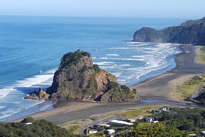 Explore BLACK SAND PIHA BEACH, and Water Falls in West Auckland - Lion Rock and the character of Piha Beach