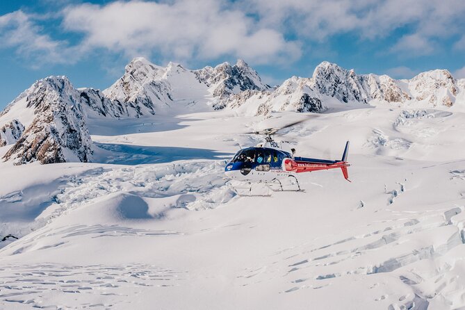 Fox Glacier and Mount Cook Helicopter Flight with Snow Landing - Flying above Fox Glacier in a six-seat helicopter