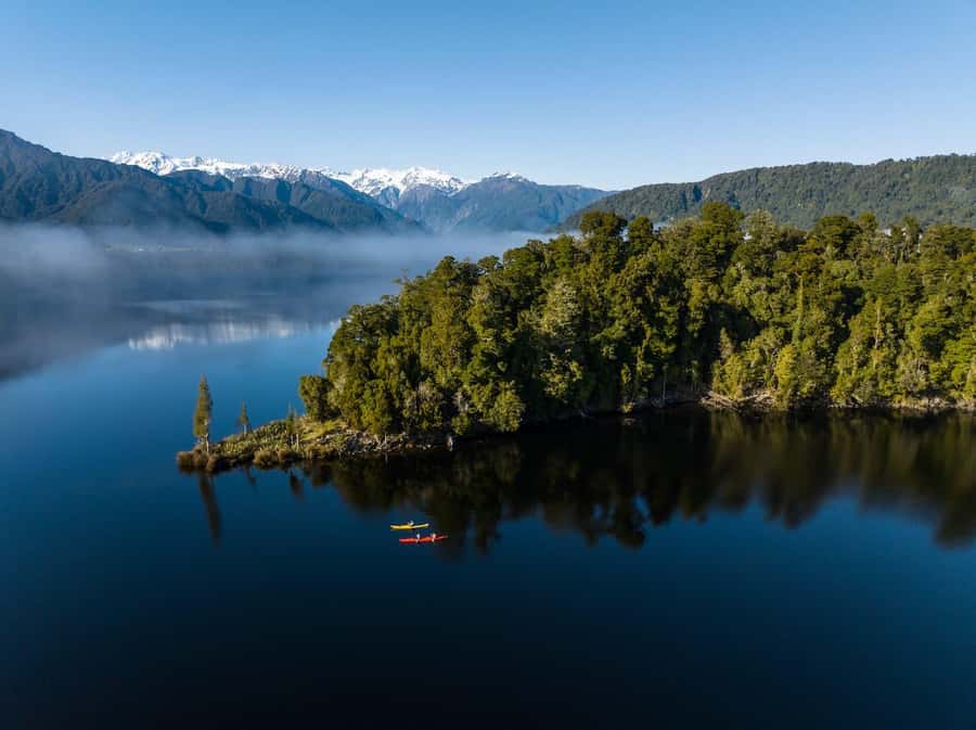 Franz Josef: Kayak & Walking Tour to Okarito Kiwi Sanctuary - Walking into the Okarito Kiwi Sanctuary