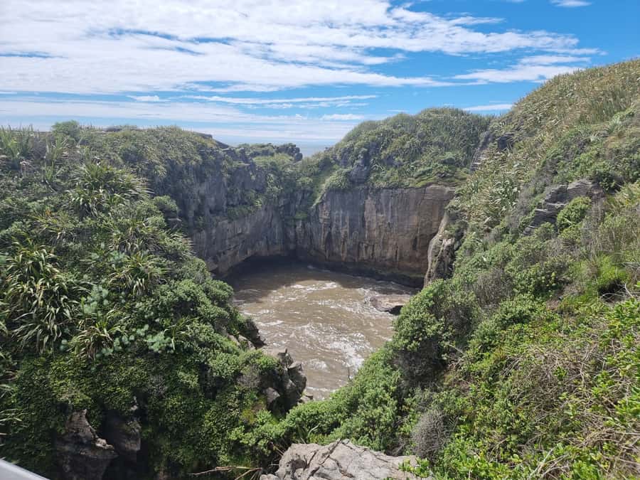 From Greymouth: Punakaiki Blowholes & Pancake Rocks Tour - The Truman Track and its sandy bay