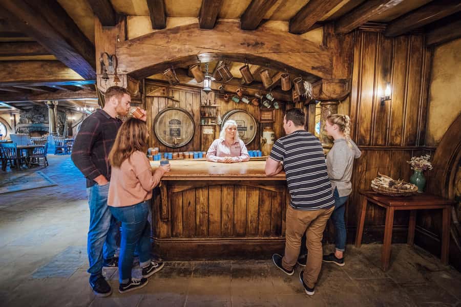 From Matamata: Guided Hobbiton Experience with Bus Transfers - The Mill, water, and Green Dragon Inn