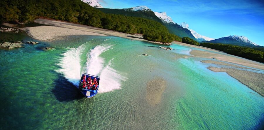 From Queenstown: Dart River Canoe & Jet Boat Day Trip - Paddling a Funyak through the Dart River