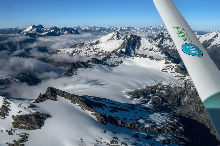 From Queenstown: Milford Sound Flight and Cruise with Lunch - Flying over glaciers, valleys, and film country