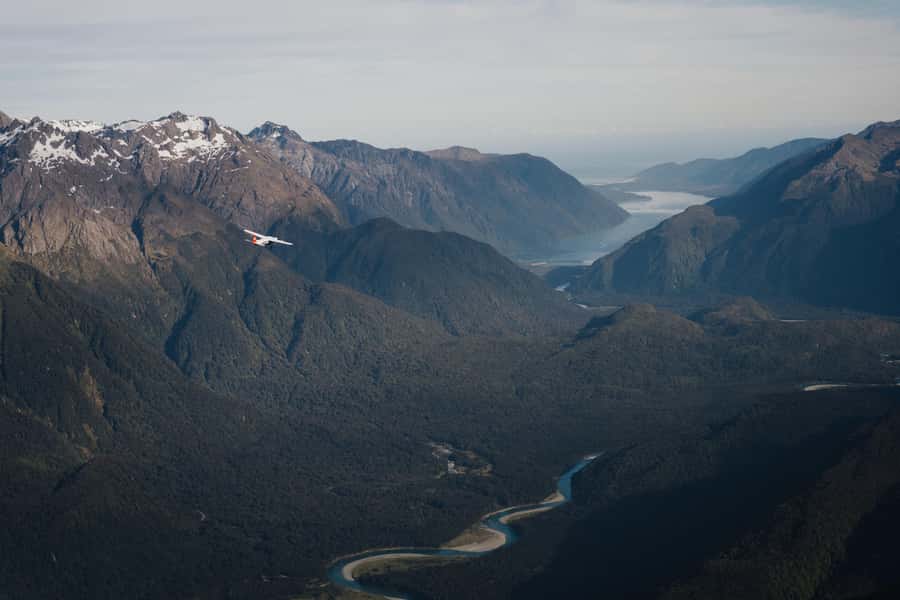 From Queenstown: Milford Sound Full-Day Trip by Plane & Boat - Landing beside Milford Sound and reaching the docks
