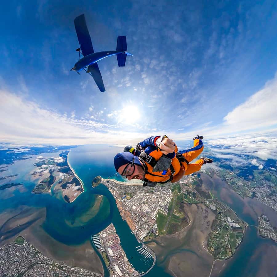 From Tauranga: Skydive over Mount Maunganui - The flight begins above Mauao and the Bay of Plenty
