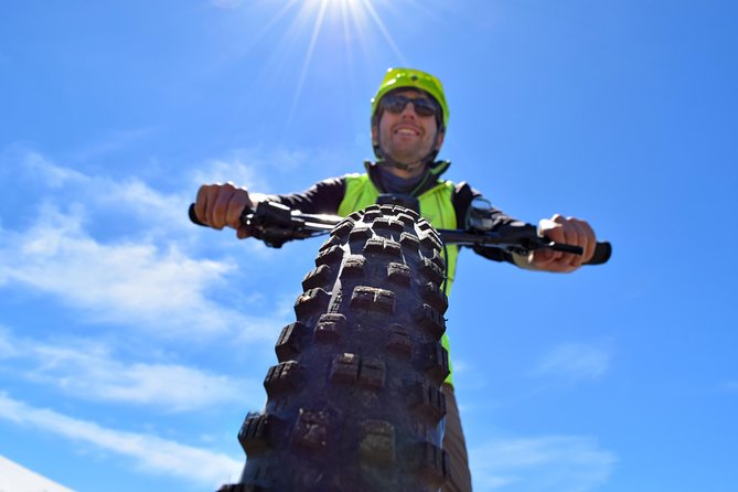 Guided Electric Mountain Bike & Sea Kayak Tour in Akaroa - The short changeover between bike and kayak