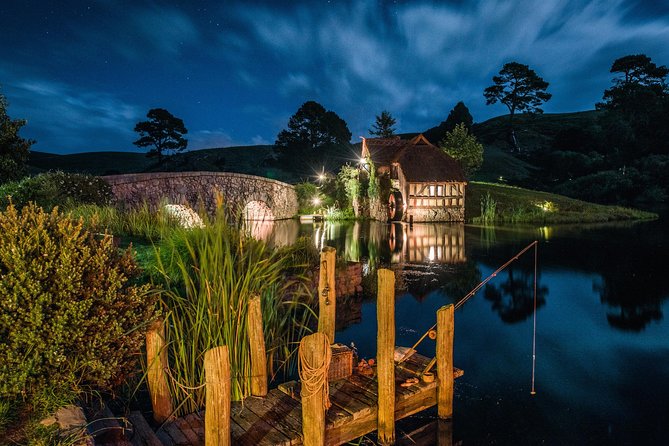 Hobbiton & Waitomo Caves Guided Day Trip from Auckland incl lunch - Walking through Hobbiton Movie Set