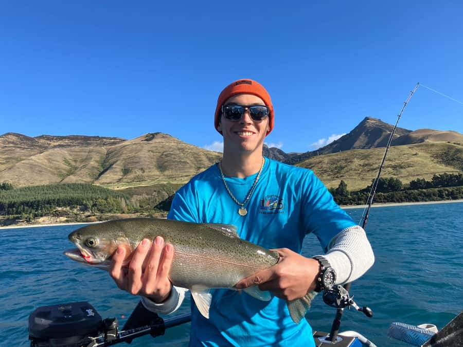 Lake Wakatipu: 3 Hour Fishing Adventure by Boat - Setting out from Queenstown’s blue boat