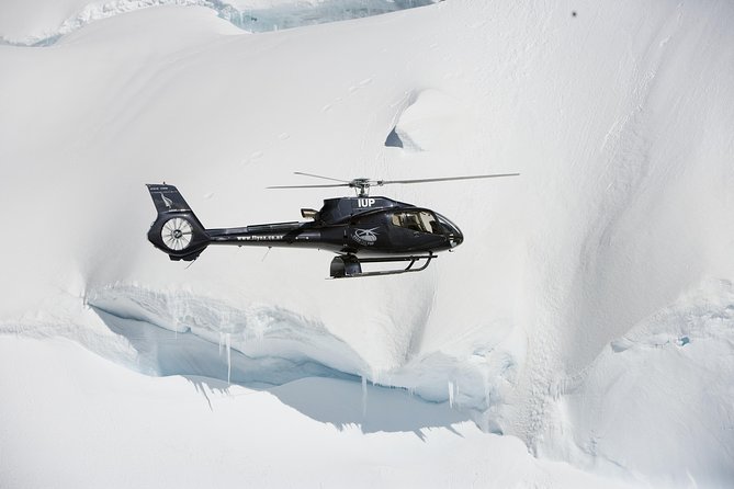 Milford Sound and the Glaciers Helicopter Tour including Landing from Queenstown - Touching down beside an ancient glacier