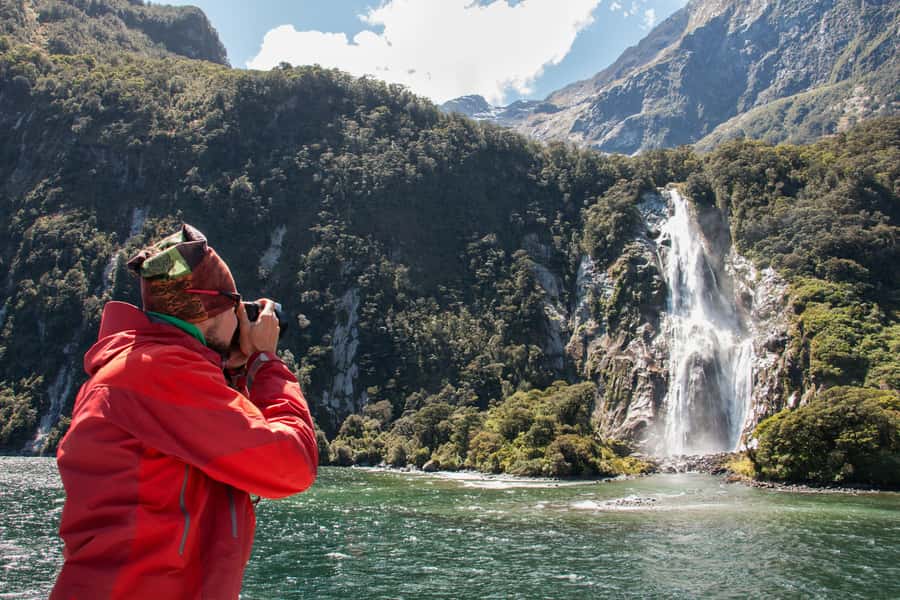 Milford Track: Full Day Guided Hike and Nature Cruise - Cruising beneath Mitre Peak and the waterfalls
