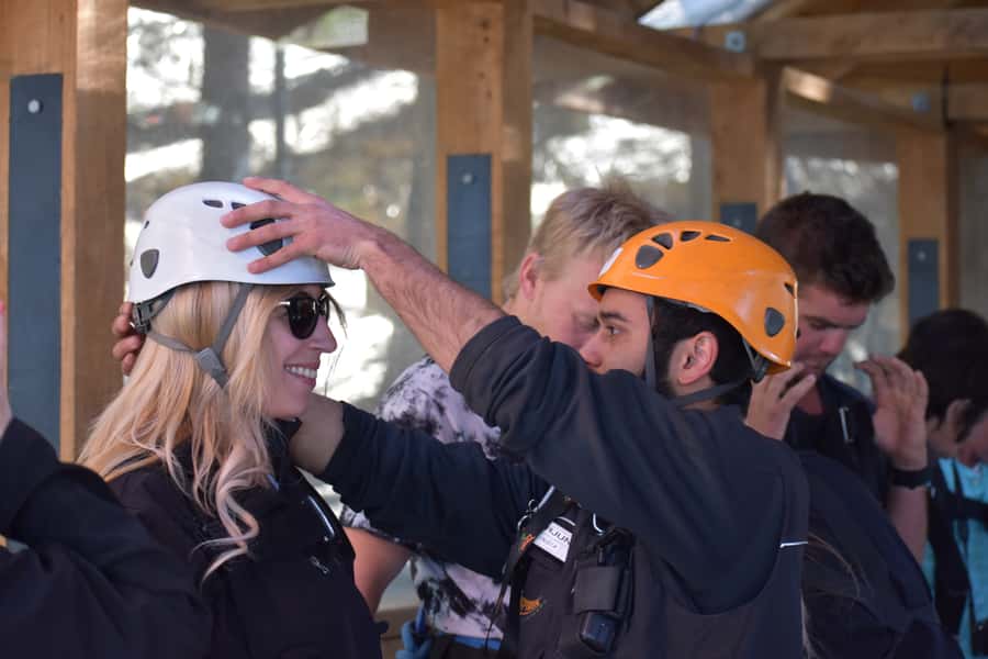 Queenstown: 1-Hour Zipline Tour with 2-Lines & 21-Meter Drop - Harnessing up for two treetop zip lines