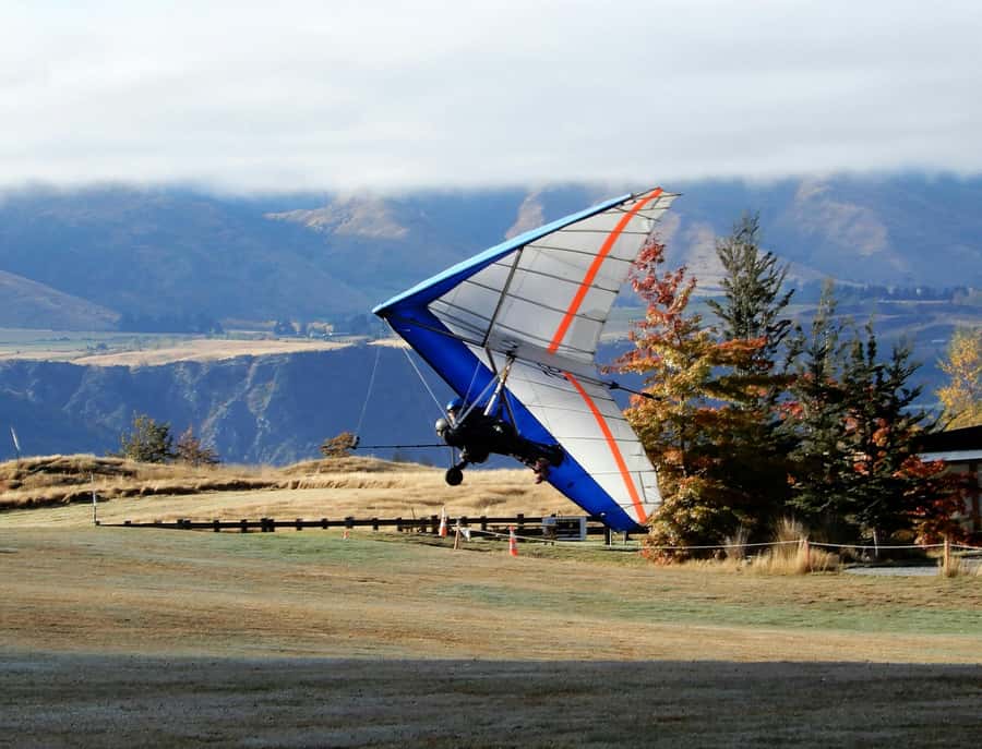 Queenstown: Tandem Hang Gliding Experience - Leaving Queenstown for a high mountain launch