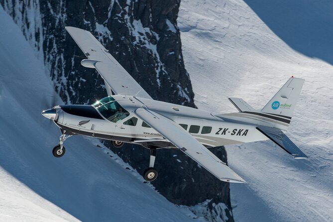 Scenic Flight Transfer to Queenstown from Milford Sound - Climbing above Mitre Peak and Bowen Falls