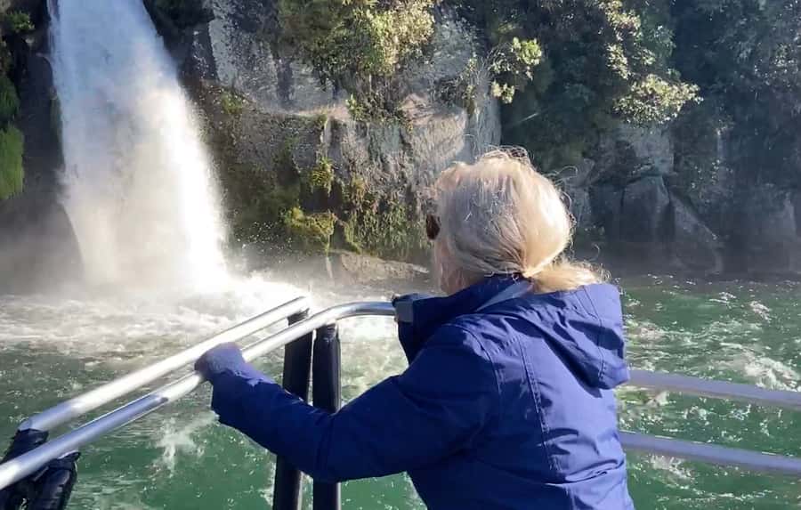 Taupo: Lake Taupo Western Bays Catamaran Tour with Bush Walk - Otupotu Falls from the catamaran bow