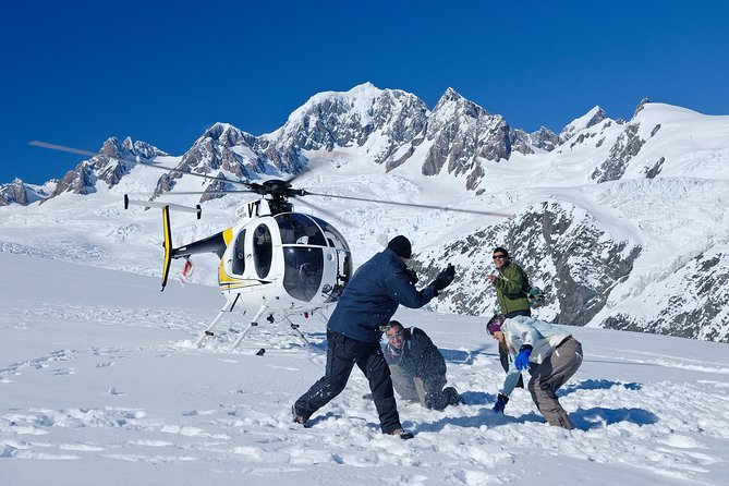 Twin Glacier Franz and Fox, snow landing (allow 30 mins - departing Franz Josef) - The takeoff and coastal views