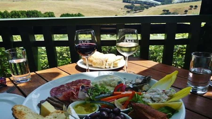 Waiheke: Scenic Taste and Graze Tour with Wine, Whisky, Beer - Mudbrick Vineyard and the first Waiheke view