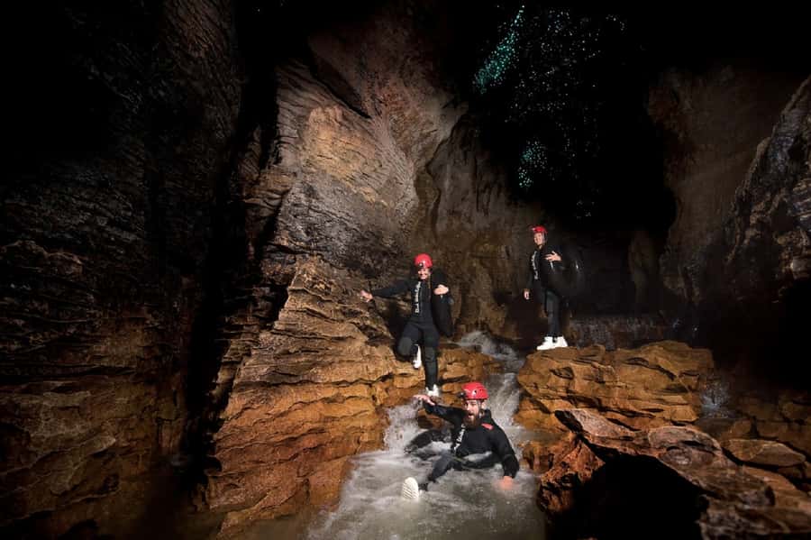 Waitomo Caves Black Abyss Ultimate Caving Experience - Ziplining beneath the glowworms