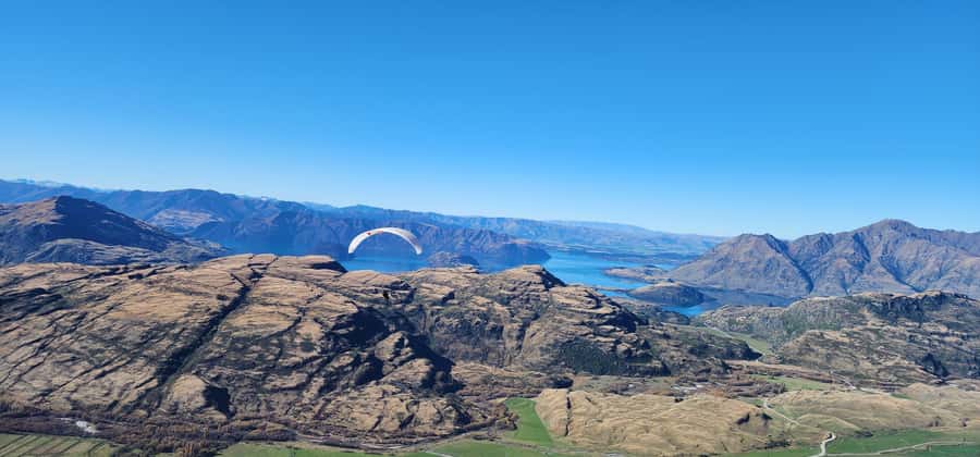 Wanaka: Tandem Paragliding Experience - Taking off above the Matukituki Valley
