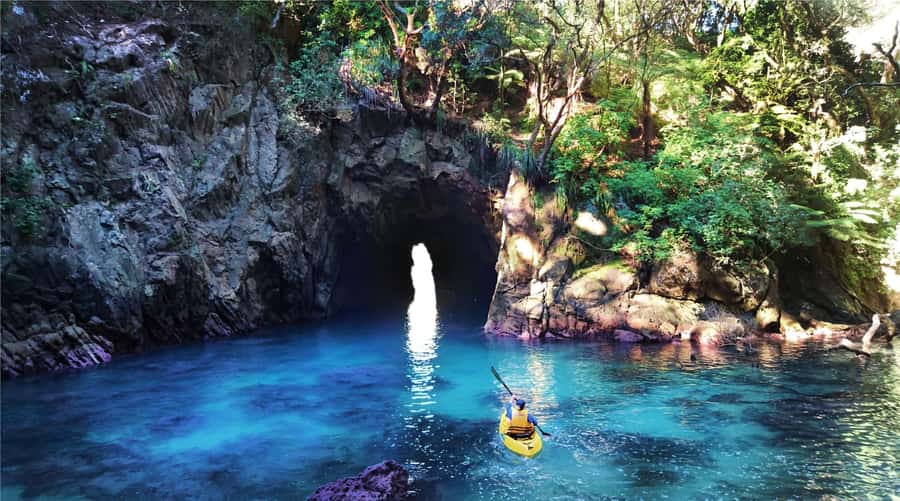 Whangamata: Donut Island Guided Kayaking Experience - The narrow passage into the turquoise lagoon