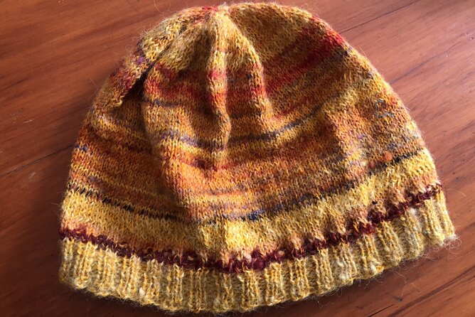 Wool Sheep Farm Experience with Handmade Wool Hat in New Zealand - From freshly shorn fleece to hand-spun yarn
